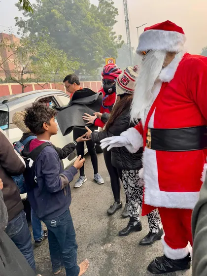 It's more than just a ride, it's about spreading joy. Here we are during our annual Christmas ride, dressed as Santa and handing out warm blankets to those in need on the streets of Delhi.