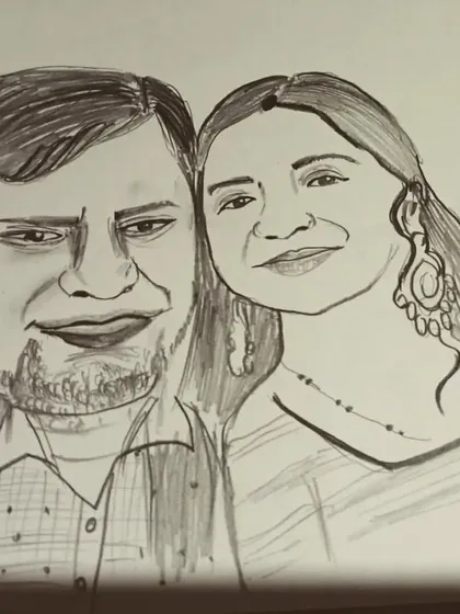 A close-up of a new caricature order for a couple, showcasing the detailed linework.