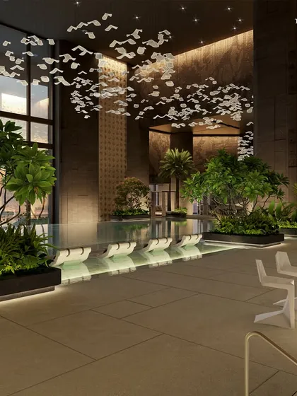 Another view of the Palais Royale pool, where expansive decks invite mixing and lingering. Quiet niches and social lounges balance privacy with a sense of occasion, all under a canopy of sculptural light fixtures.