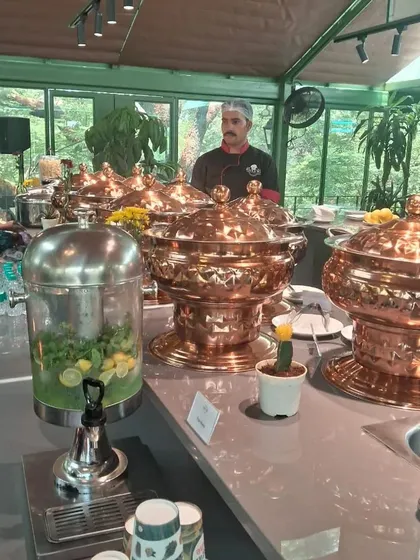 We believe presentation is just as important as taste. Here is one of our elegant buffet setups featuring our signature copper serveware, perfect for making a statement at corporate family days and annual functions.