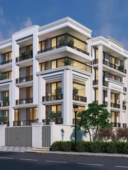 This neoclassical apartment building features strong vertical lines created by classical pilasters and repeating window patterns. The design maintains a stately and elegant presence while providing modern living spaces.