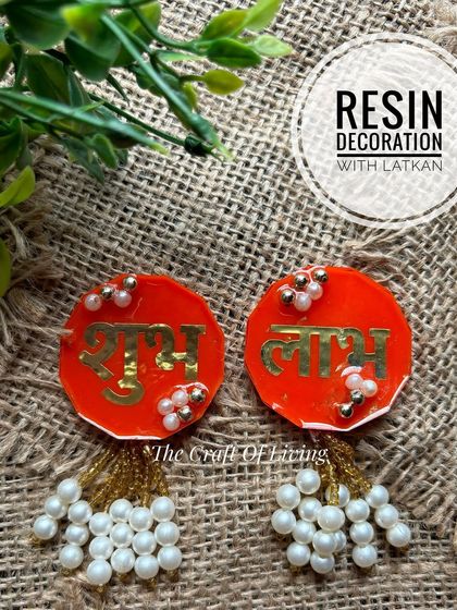 Another look at the red resin Shubh Labh decorations, this time with beautiful pearl latkans, ready to adorn your home for the festive season.