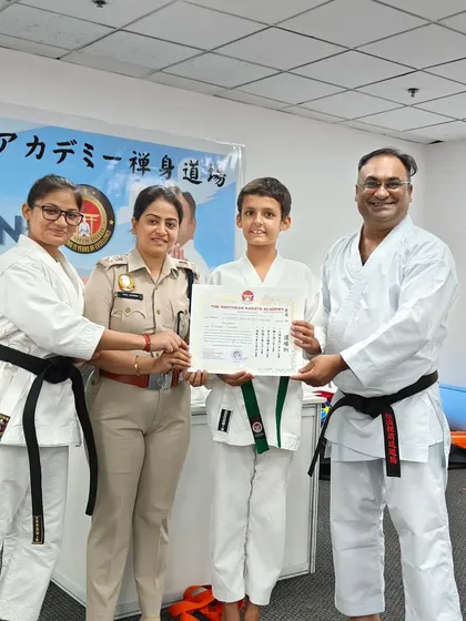 Another one of my students being awarded his certificate by DCP Tanu Sharma. Having role models from the police force visit our dojo inspires the children and reinforces the value of discipline and service.
