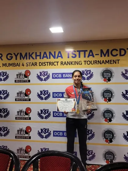 Ananya Chande on the podium after winning the U-19 girls' title at the Khar Gymkhana tournament. She also reached the quarterfinals in the Women's category, a great performance overall.