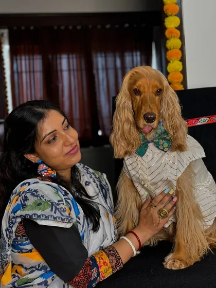 A sweet moment between me and Posto, both dressed for the second day of Navratri.