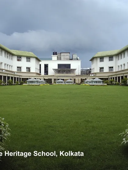 The Heritage School in Kolkata features a large central quadrangle, a classic element of institutional design. This expansive green lawn provides a space for formal events and informal recreation, promoting a sense of community and well-being.