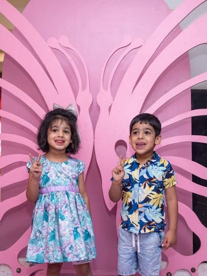 Photo opportunities are a must at any party. I created this giant pink butterfly wing prop, which served as a perfect, fun photo booth backdrop for the kids at this fairy garden party.