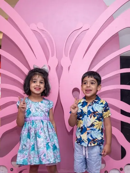 Photo opportunities are a must at any party. I created this giant pink butterfly wing prop, which served as a perfect, fun photo booth backdrop for the kids at this fairy garden party.