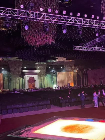 The calm before the storm. This is the view from my station before a large corporate event, with the grand stage and empty seats waiting to be filled.