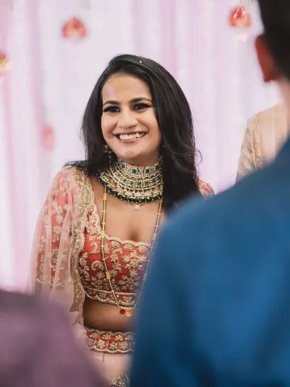 A candid shot of the bride's beautiful smile during her reception.