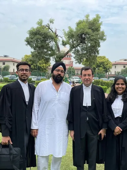 A landmark moment in my career, standing with my client and senior counsel outside the Supreme Court. We successfully defended the constitutionality of the Haryana Sikh Gurudwara (Management) Act, 2014, a case of immense significance.