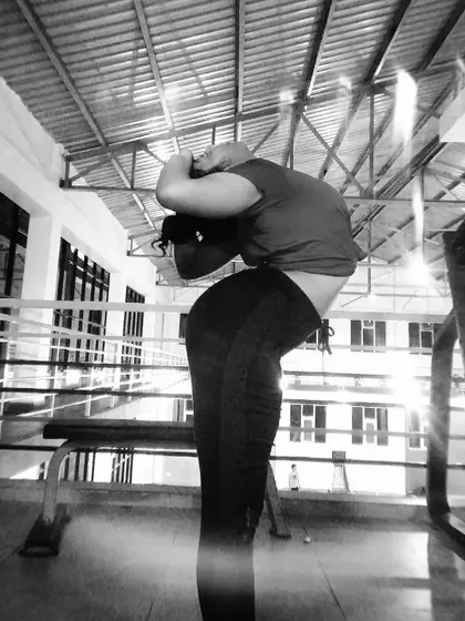 Exploring a deep standing backbend. This level of spinal flexibility comes from consistent practice and a deep understanding of how to engage the core to protect the lower back.