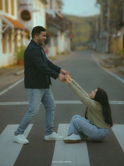 A fun and quirky moment on a crosswalk. I love to find creative ways to tell a couple's story using the urban environment.