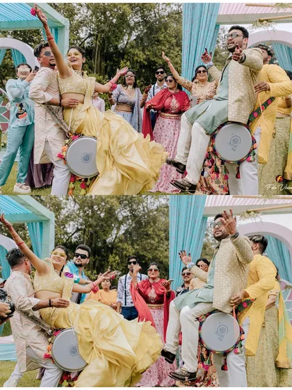 Pure fun and celebration. The couple being lifted onto the dhols is a moment of spontaneous joy that makes for an unforgettable photo and memory.