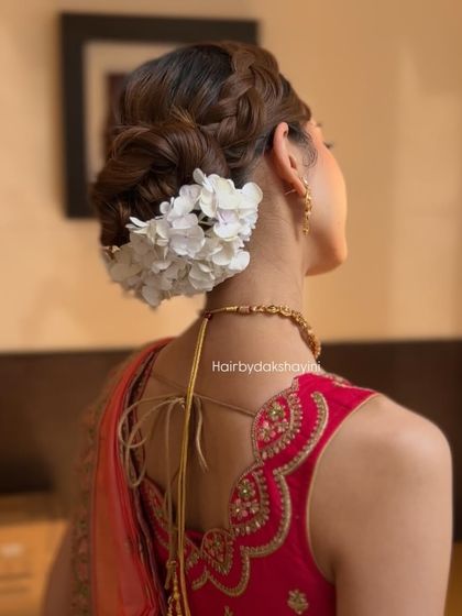 A side view of the elegant braided bun, a romantic and sophisticated choice.