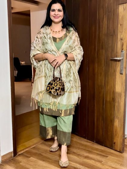 This pastel green suit is a great example of an outfit from scratch. I used simple laces on the neckline and hem to elevate the look, giving it a Pakistani-inspired design feel.