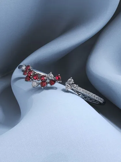 Some jewellery stays with you forever, not just for its sparkle, but for the memories it carries. This set of two custom rings, one with a ruby cluster and one a simple diamond band, was created to hold a client's most precious moments.