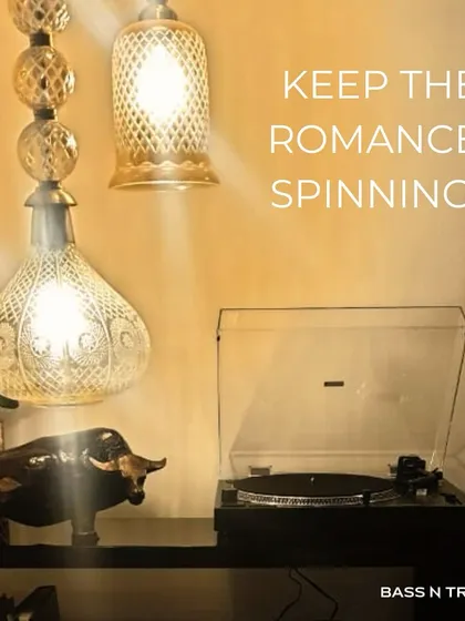 Keep the romance spinning. A turntable setup under warm lighting creates an unbeatable ambiance for a cozy evening with your favorite records.
