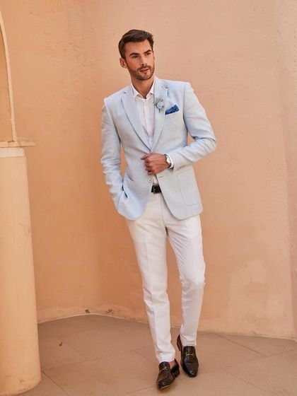 Another angle of the Arctic Blue linen suit, proving its impeccable tailoring from every view. This is the kind of sartorial summer suit that gets you noticed for all the right reasons.