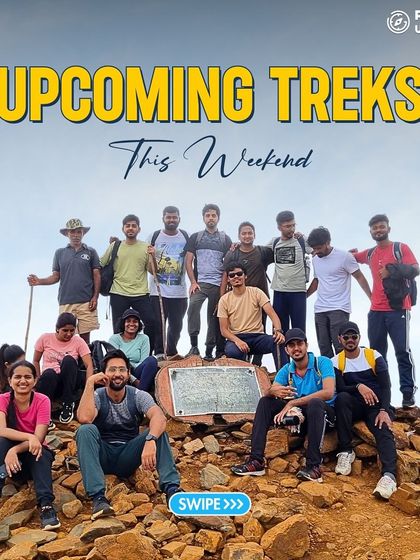A group of trekkers on a rocky summit, ready for their next challenge. Swipe to see our upcoming treks.