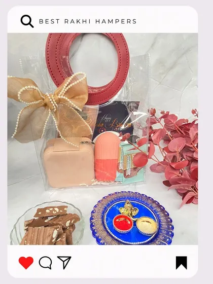 'The Minimalistic Bag' is a chic and simple Rakhi gift. This transparent bag with a red handle contains a curated selection of items perfect for a sister with modern taste.