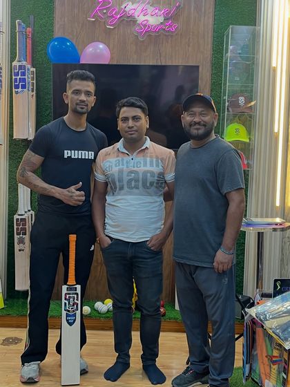 With the owners of Rajdhani Sports after getting my new custom made Sweat Pro bat. It's important to have a good relationship with your equipment provider.
