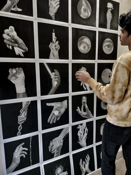 Arranging the pieces for the final photo. It was satisfying to place each drawing into the grid and see the full series emerge.