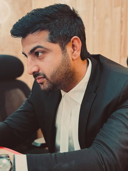 Focused at my desk. As a lawyer, my primary duty is to my client and their case.