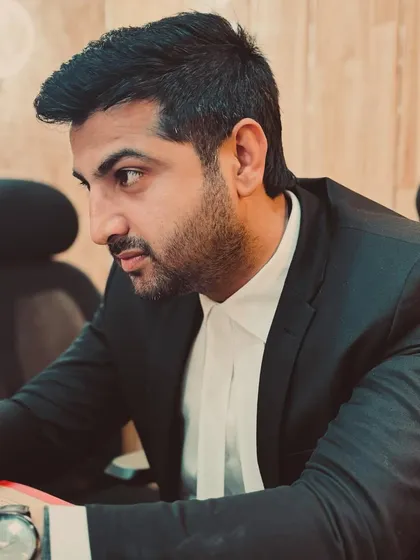 Focused at my desk. As a lawyer, my primary duty is to my client and their case.