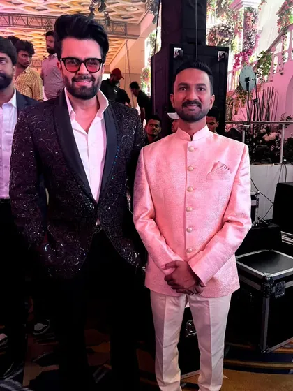 A truly memorable moment sharing the stage with Manish Paul, one of India's top hosts, at the Jio World Convention Center in Mumbai. I was honored to perform a live sand art and glitter painting show for this grand engagement ceremony.