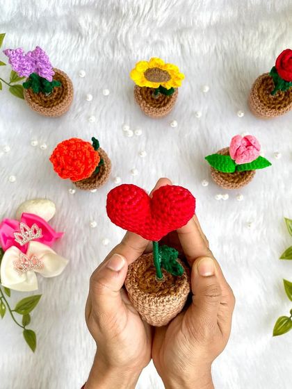 My hands cradling the little potted heart. It’s a simple and sweet way to send a message of love.