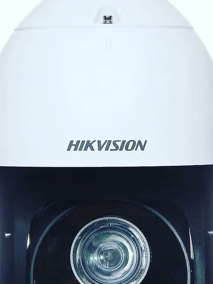 I use modern, high-quality cameras like this Hikvision dome camera. This type is great for providing wide coverage and clear images for both indoor and outdoor security monitoring.
