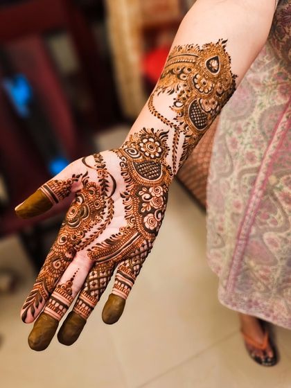 A single-arm view of the elegant engagement henna, perfect for pre-wedding festivities.