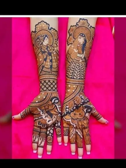 This design showcases my skill in creating divine figures, with detailed portraits of Radha and Krishna, perfect for bringing a spiritual touch to your festive mehndi.