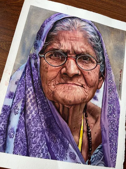 A closer look at the finished portrait, showing the fine details on the paper. You can see the texture of the 300 gsm paper and how the watercolor pigment settles into it.