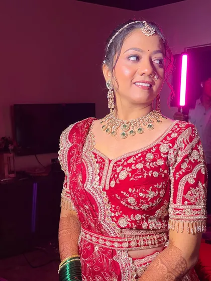 A happy, smiling bride. The soft glam makeup enhances her features beautifully.