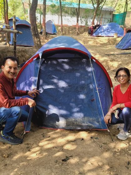 Participants setting up their tent at the Ultimate Survival Camp. Our bootcamps offer a complete outdoor experience, including camping under the stars.