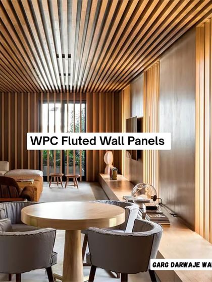 A beautiful living room where our WPC fluted panels have been used on both the walls and the ceiling, creating a seamless, cozy, and sophisticated wooden look.