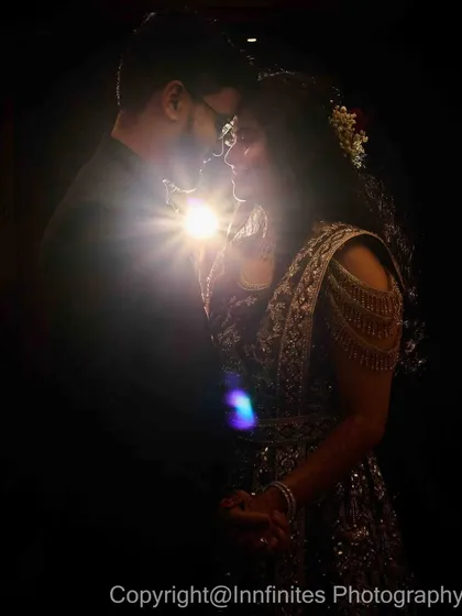 For couples who love a touch of drama, I use creative lighting to craft these cinematic, high-contrast portraits. This style of photography creates a powerful, movie-like feel for your wedding album.