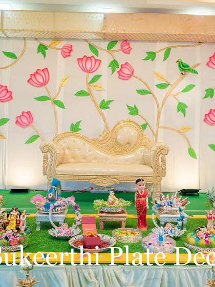 A full view of the beautiful baby shower stage decoration. My platter arrangements are designed to complement the overall decor, creating a cohesive and picture-perfect setting.