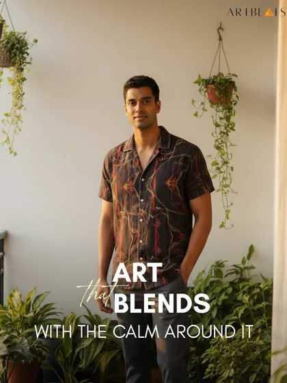 The Crimson Echo shirt styled in a natural setting, showing how the art blends with the calm around it. It’s a piece that feels both strong and alive.