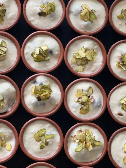 An overhead shot of our Phirni bowls, showing the consistent quality and beautiful garnish on each serving.
