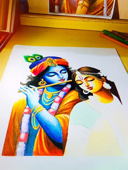 The divine love of Radha and Krishna, brought to life with color pencils. Creating this piece was a meditative process, blending vibrant blues, oranges, and soft whites to capture their spiritual connection. This A3 size artwork took 10 hours of dedicated work.