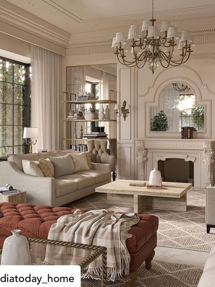 Featured in India Today Home, this living room from "The Colonial House" project showcases a blend of European influences. A deep red ottoman adds a bold touch of color to the otherwise neutral space, centered around a classic fireplace.