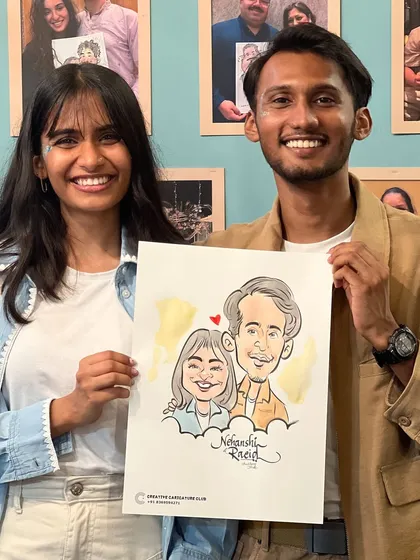 This happy couple's portrait captures their bright smiles. A caricature is a fun and unique alternative to a standard photo.