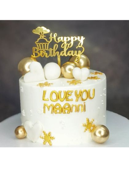 A simple and elegant white and gold cake for "Maami". This choco-chip cake is decorated with golden spheres and fondant hearts.