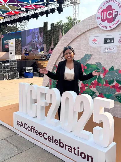 All smiles at the India International Coffee Festival. I love engaging with attendees and creating a lively, welcoming atmosphere at large-scale public events.