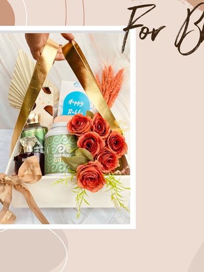 A stylish Rakhi hamper designed for both Bhaiya and Bhabhi. This triangular basket combines gifts for him and her, beautifully decorated with flowers and premium items.