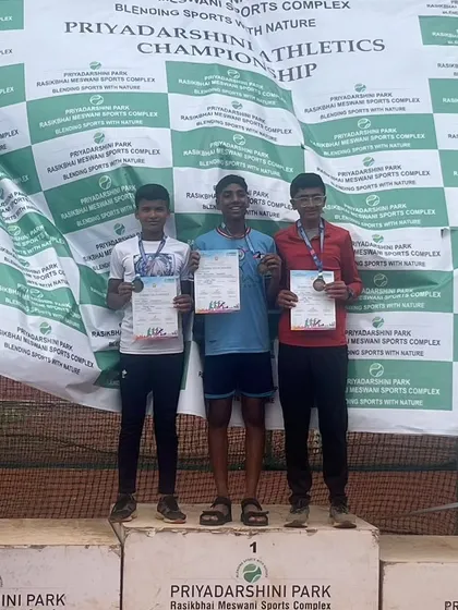 Piyush stands proudly on the podium after winning a silver medal in the 600m race. His achievement is a proud moment for the entire Trackblazers family.