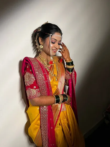 The complete look for my bride Sayali, showcasing the beautiful draping of her Paithani saree and the traditional jewellery.